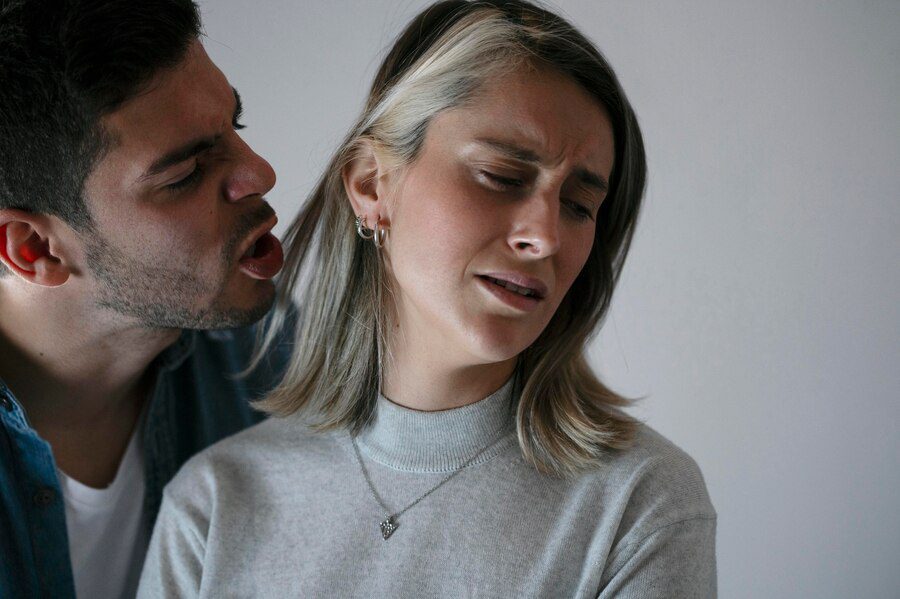 Illustration showing a person defending themselves from domestic violence in a California household setting