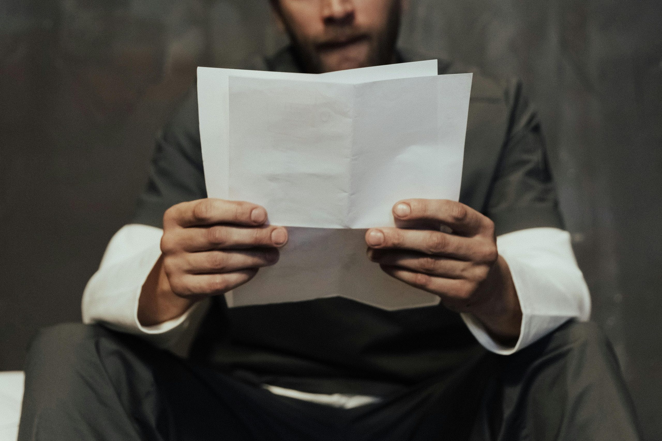 Defense attorney consulting with client about false rape allegations