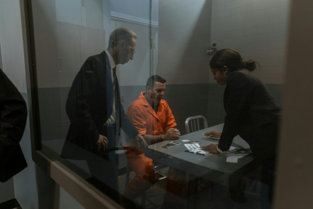 Los Angeles criminal defense attorney explaining the duress defense to a client.