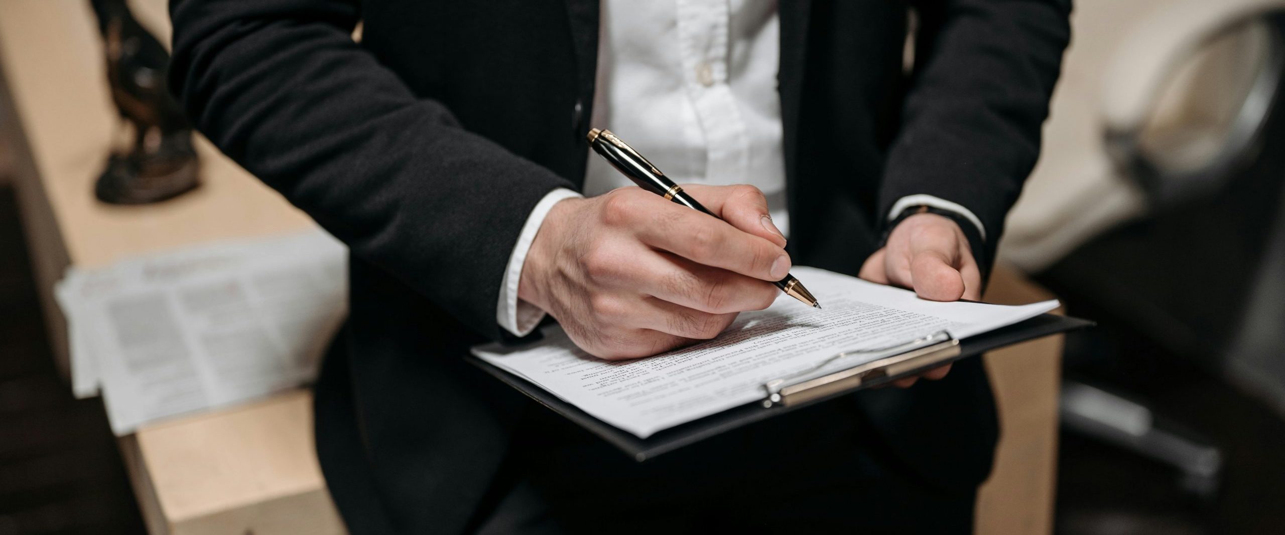 Los Angeles white collar crime lawyer discussing pretrial settlement options with client
